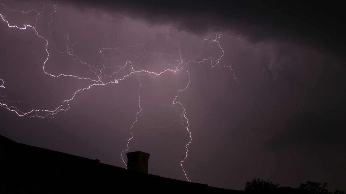 Powerful lightning bolts illuminate the night sky over Cape Town, capturing nature's raw energy.