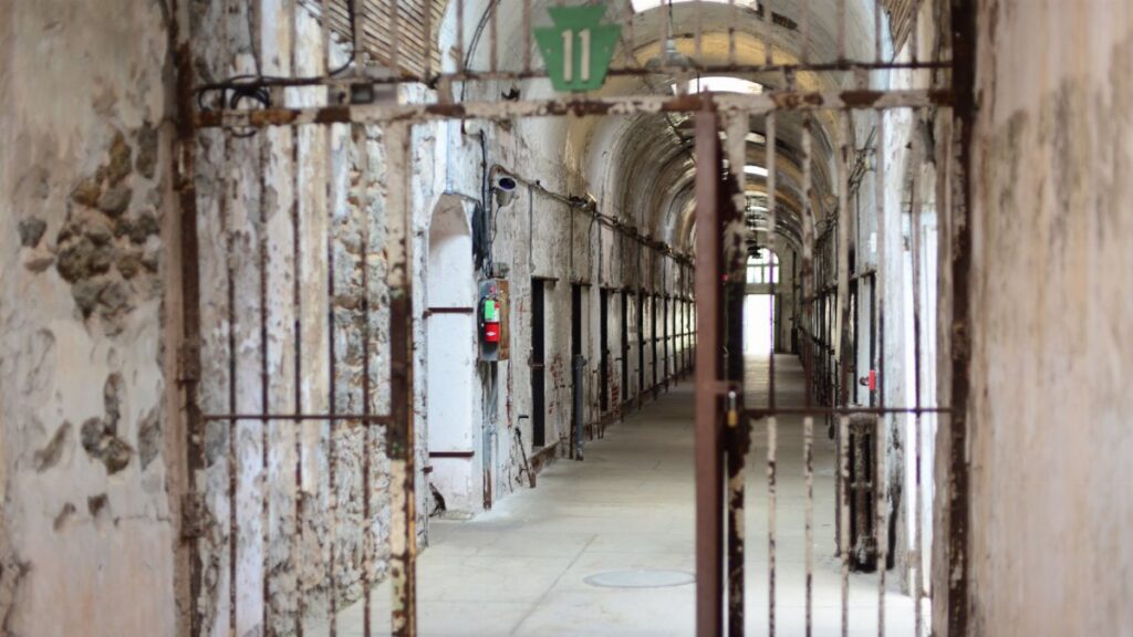 Rustic interior of Eastern State Penitentiary in Philadelphia, showcasing decay.