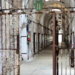 Rustic interior of Eastern State Penitentiary in Philadelphia, showcasing decay.