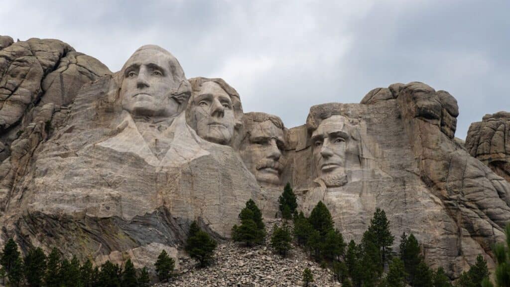 A striking view of Mount Rushmore featuring the carved faces of U.S. Presidents in the Black Hills of South Dakota.
