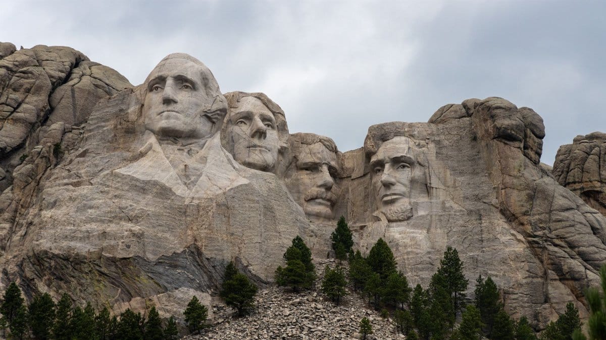A striking view of Mount Rushmore featuring the carved faces of U.S. Presidents in the Black Hills of South Dakota.