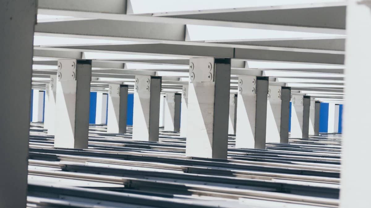 Abstract view of modern architecture showcasing repetitive geometric patterns and structural elements.
