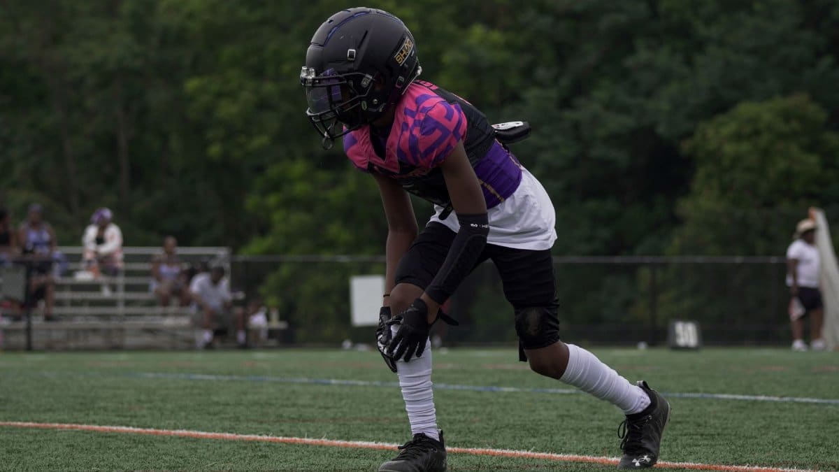Youth football player in action on the field in Columbia, MD.