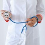 Professional doctor with a stethoscope, focusing on healthcare and medical services.
