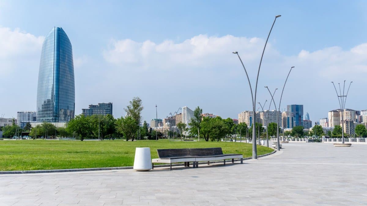 View of modern architecture and open spaces in downtown Baku on a sunny day.