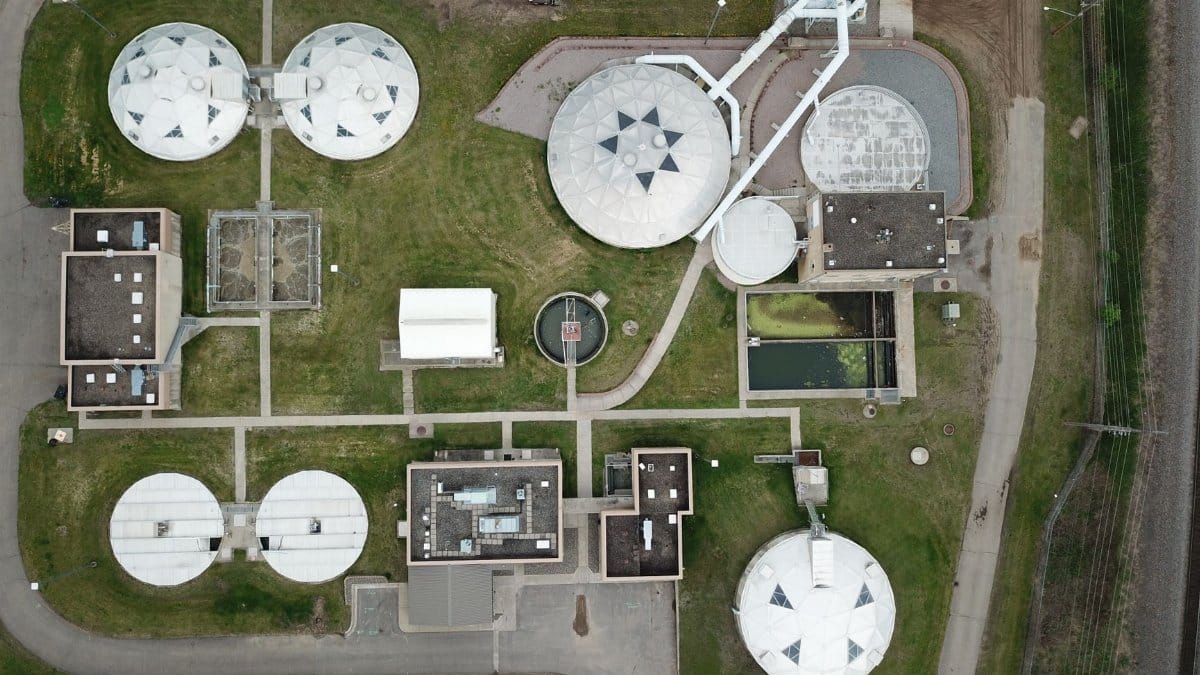 Aerial view of a structured water treatment plant showcasing various components.