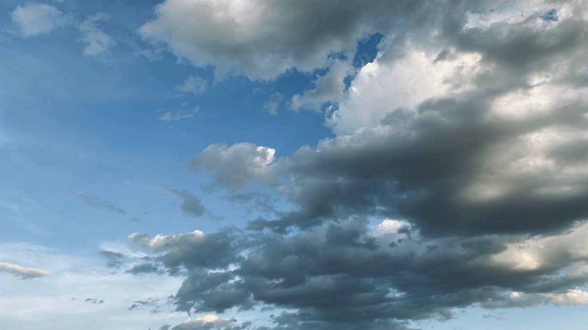 A dynamic cloud formation in the blue sky over Austin, Texas, showcasing nature's beauty.