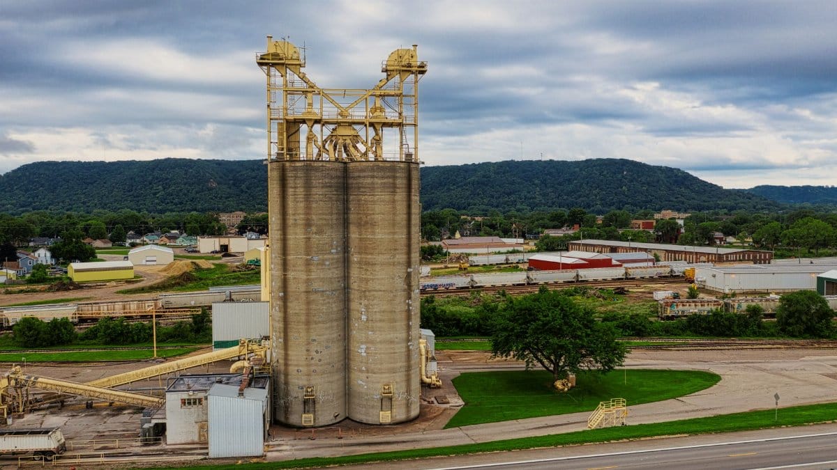 Aerial view of an industrial site with surrounding landscape in Winona, Minnesota.