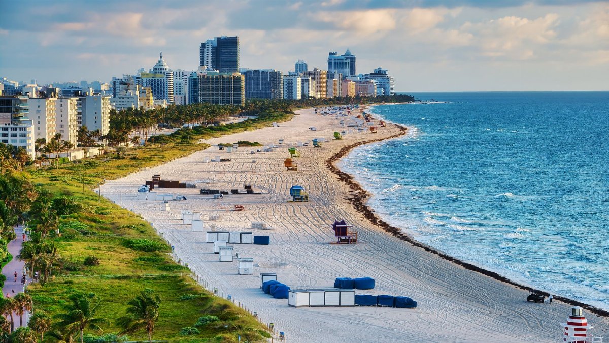 Aerial photo of Miami Beach with skyline and ocean, showcasing a vibrant summer cityscape.