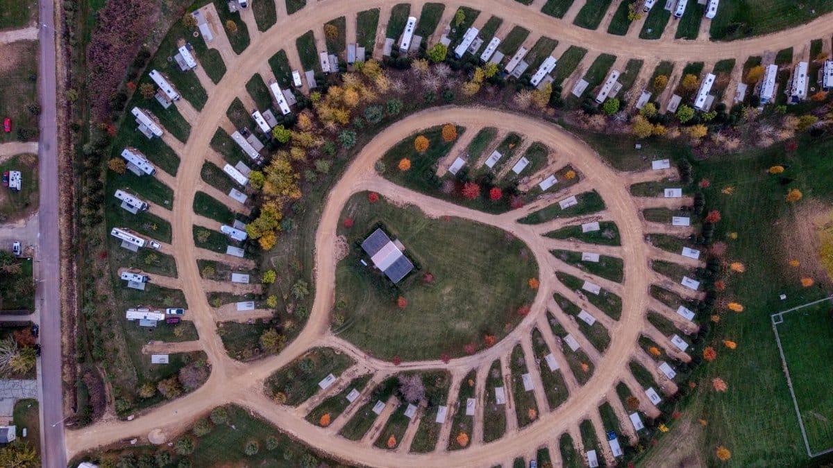 Aerial shot of arranged RVs in a park during fall in Nelson, Wisconsin.