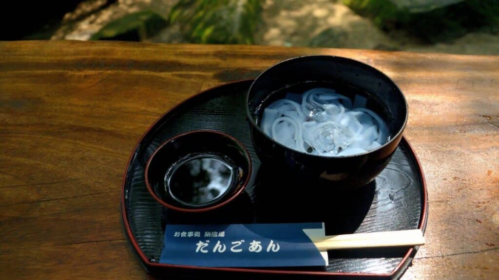 Refreshing Japanese cold noodles served on a wooden table in Fukuoka, Japan.