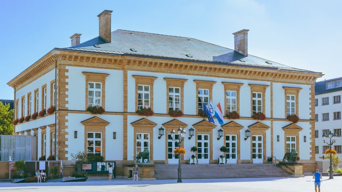 A sunny day at Luxembourg City Hall showcasing its elegant architecture and vibrant surroundings.
