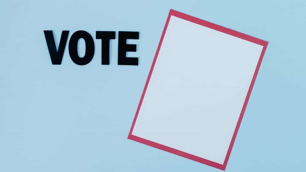 Simple conceptual image featuring the word 'VOTE' and blank paper, ideal for election themes.