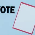 Simple conceptual image featuring the word 'VOTE' and blank paper, ideal for election themes.