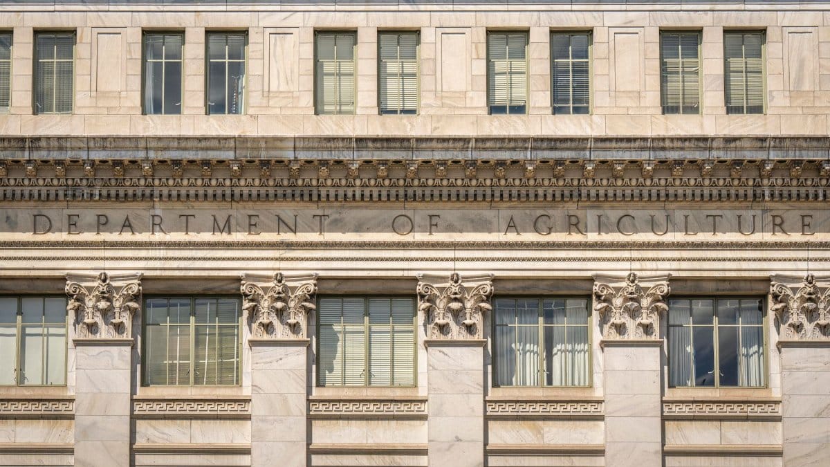 Close-up of the Department of Agriculture building's architectural facade, showcasing intricate columns and windows.