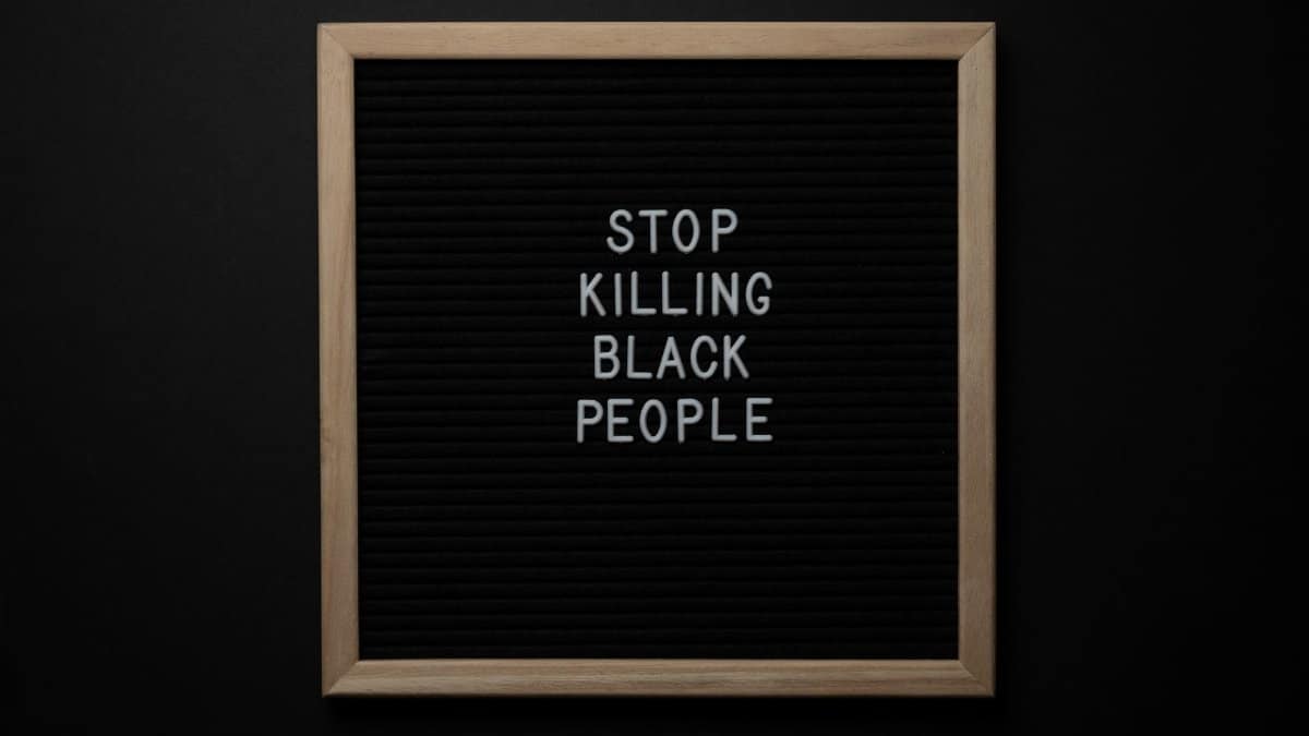 Overhead view of chalkboard with title from SJW fighting for justice and social rights