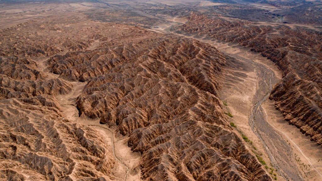 Stunning aerial photograph showcasing the rugged terrain of a canyon landscape, emphasizing natural beauty.