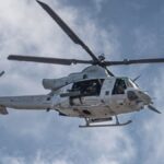 US Marine Bell UH-1Y Venom helicopter flying during the Miramar Airshow in San Diego.