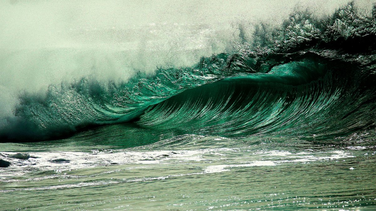 A stunning capture of a powerful ocean wave, showcasing nature's force and beauty in vivid detail.