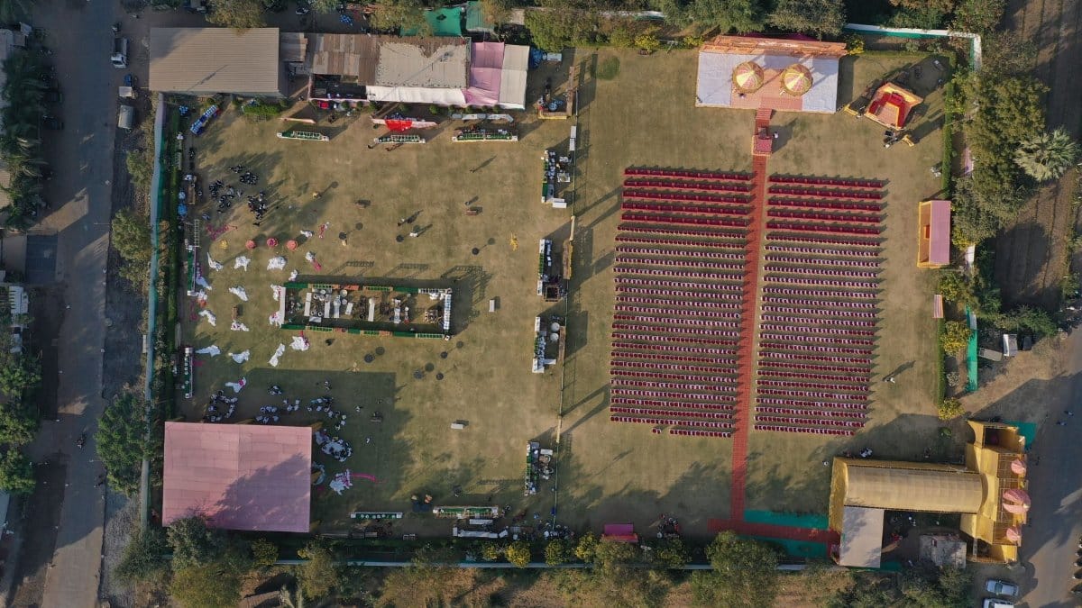 A stunning aerial view of an Indian wedding venue showing setup and decoration details.