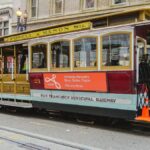 San Francisco cable car on Powell Street, showcasing classic urban transit charm.