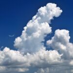 Stunning cumulus clouds in a vibrant blue sky over Sarasota, Florida.