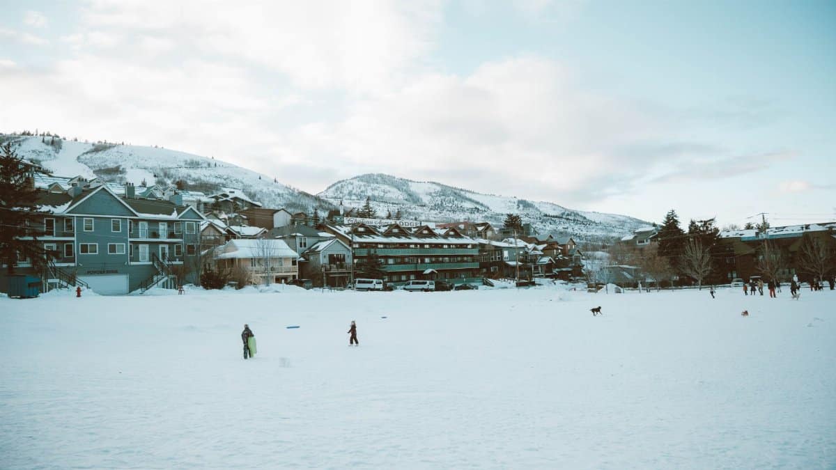 A scenic winter view in Park City with snow-covered landscapes and mountains.