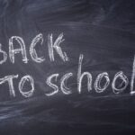 Blackboard with 'Back to School' written in chalk, ideal for educational themes.