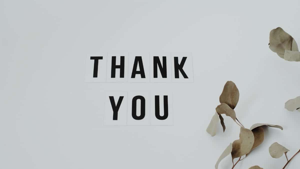 A minimalist thank you note with eucalyptus leaves, perfect for expressing gratitude.