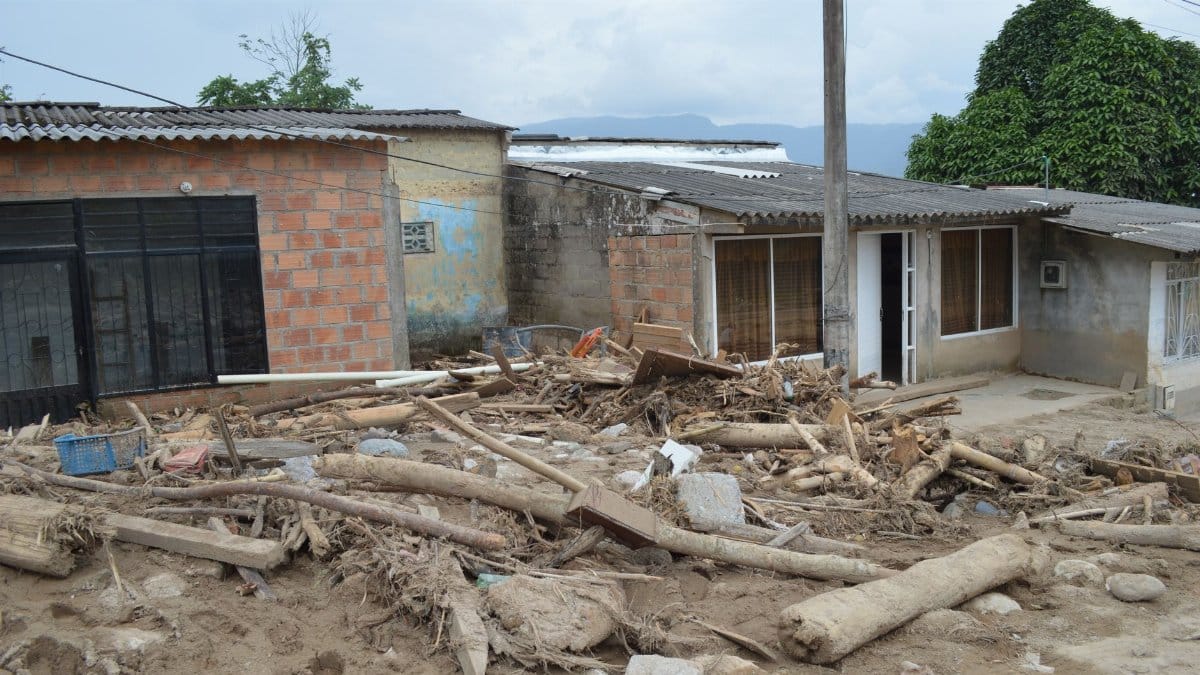 Rural village houses damaged by flood debris in Mocoa, Colombia.