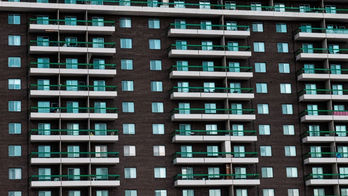 Close-up view of a modern apartment building facade with balconies in Montreal, Canada.