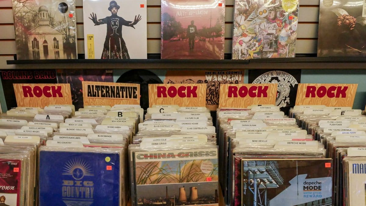 Vintage vinyl records displayed in a classic music store with a retro vibe.