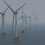 Offshore wind turbines generating clean energy in the ocean breeze.