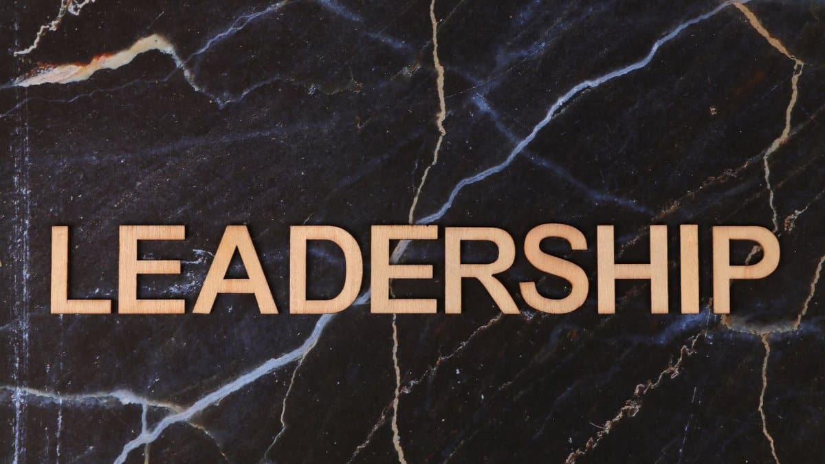 Leadership text on a striking dark marble surface, symbolizing strength.