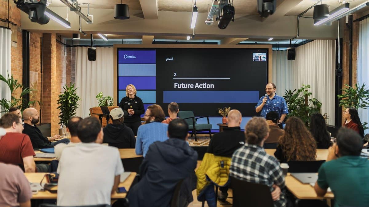 Interactive professional presentation in a modern office setting with diverse audience.