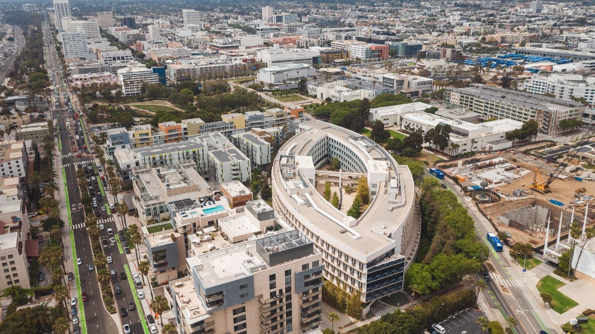 A breathtaking aerial shot of modern urban sprawl in Los Angeles, showcasing diverse architecture.