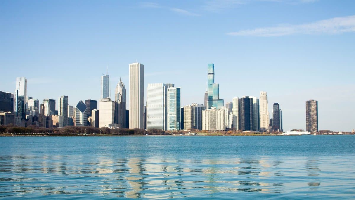 Stunning view of the Chicago skyline from Lake Michigan with clear blue skies.