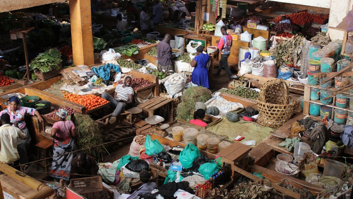 Explore the bustling activity and vibrant colors of Jinja Central Market in Uganda.