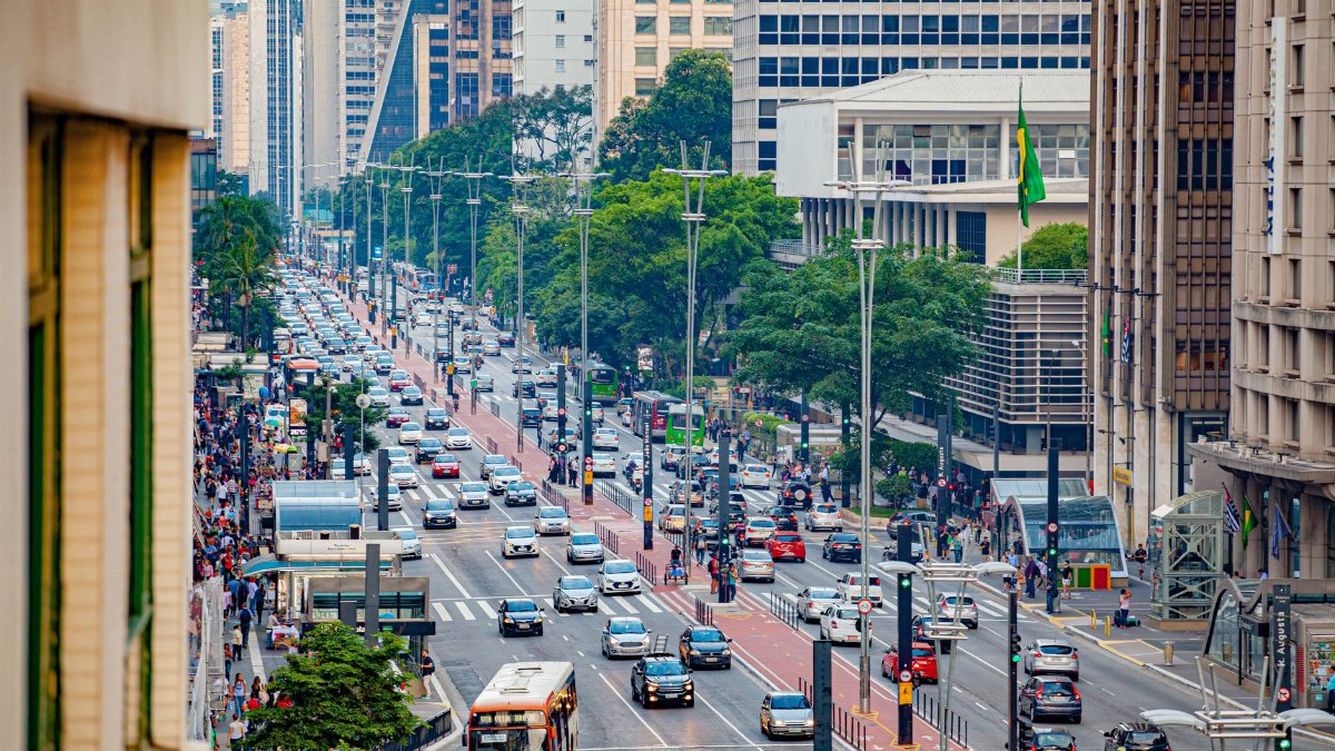 Aerial view of bustling Avenida Paulista in São Paulo, showcasing urban life and busy traffic.