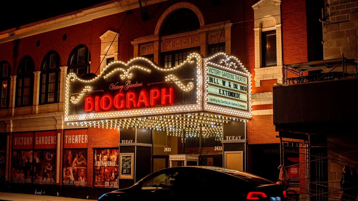 The illuminated Biograph Theater marquee shines brightly at night in Chicago, Illinois.