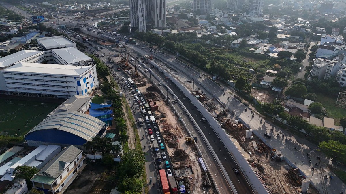 Panoramic aerial shot of highway construction in Ho Chi Minh City, Vietnam.