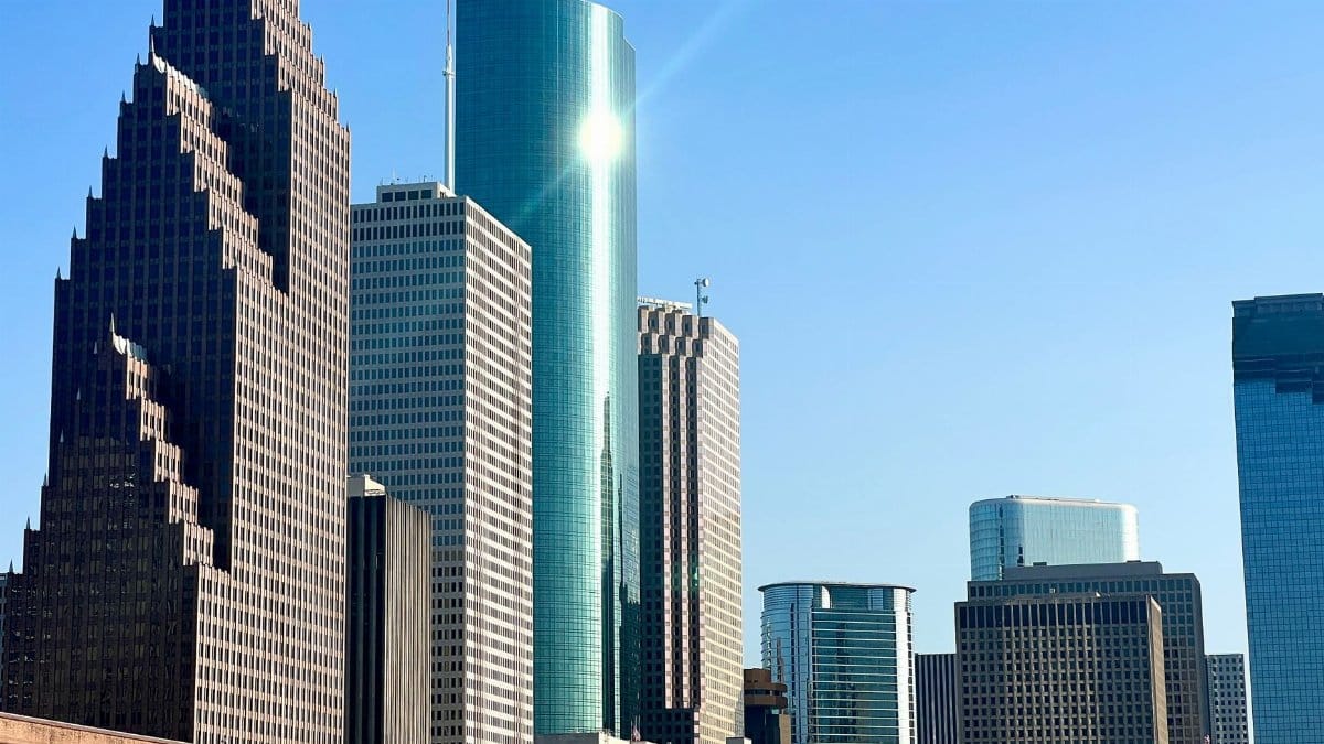Stunning view of Houston's skyscrapers under clear blue sky.