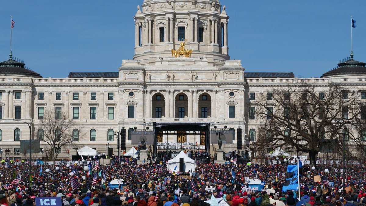 Demonstrators gathered at Minnesota State Capitol advocating for change.