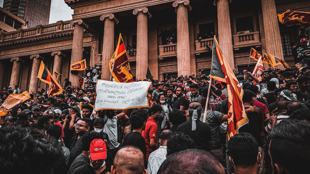 Massive political rally with protesters in Colombo, Sri Lanka, demanding change.