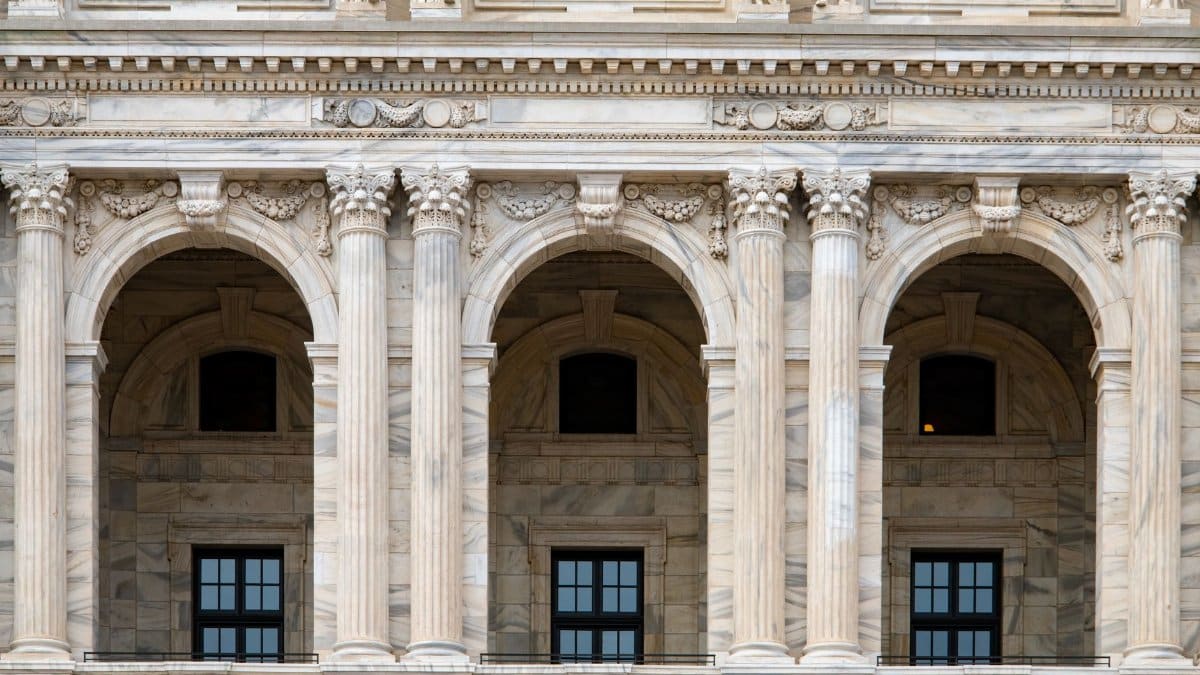 Close-up of the ornate archways and columns at the Minnesota State Capitol building.