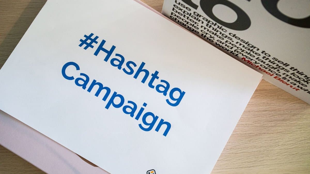 A concept image of a hashtag campaign displayed on paper for marketing strategies.