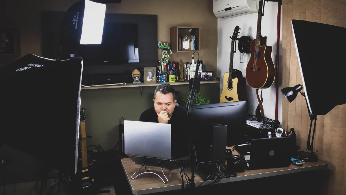 Modern music studio with guitars, computers, and lighting equipment. Ideal for creativity and technology themes.