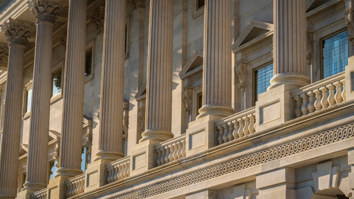 Close-up of columns and exterior architectural details of a historic landmark building.