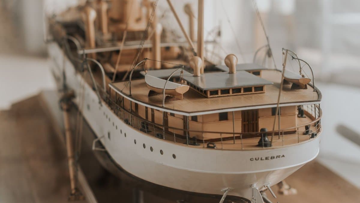 Detailed wooden model ship named 'Culebra' with visible masts and intricate craftsmanship.