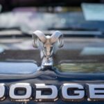 Close-up of vintage Dodge car hood with iconic ram ornament and logo in Nelson, Wisconsin.
